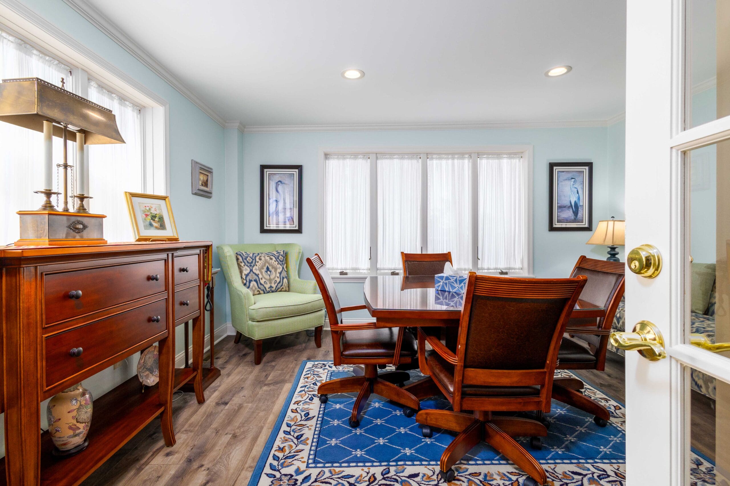 A private arrangement room at Shorac Funeral Home with a table and chairs