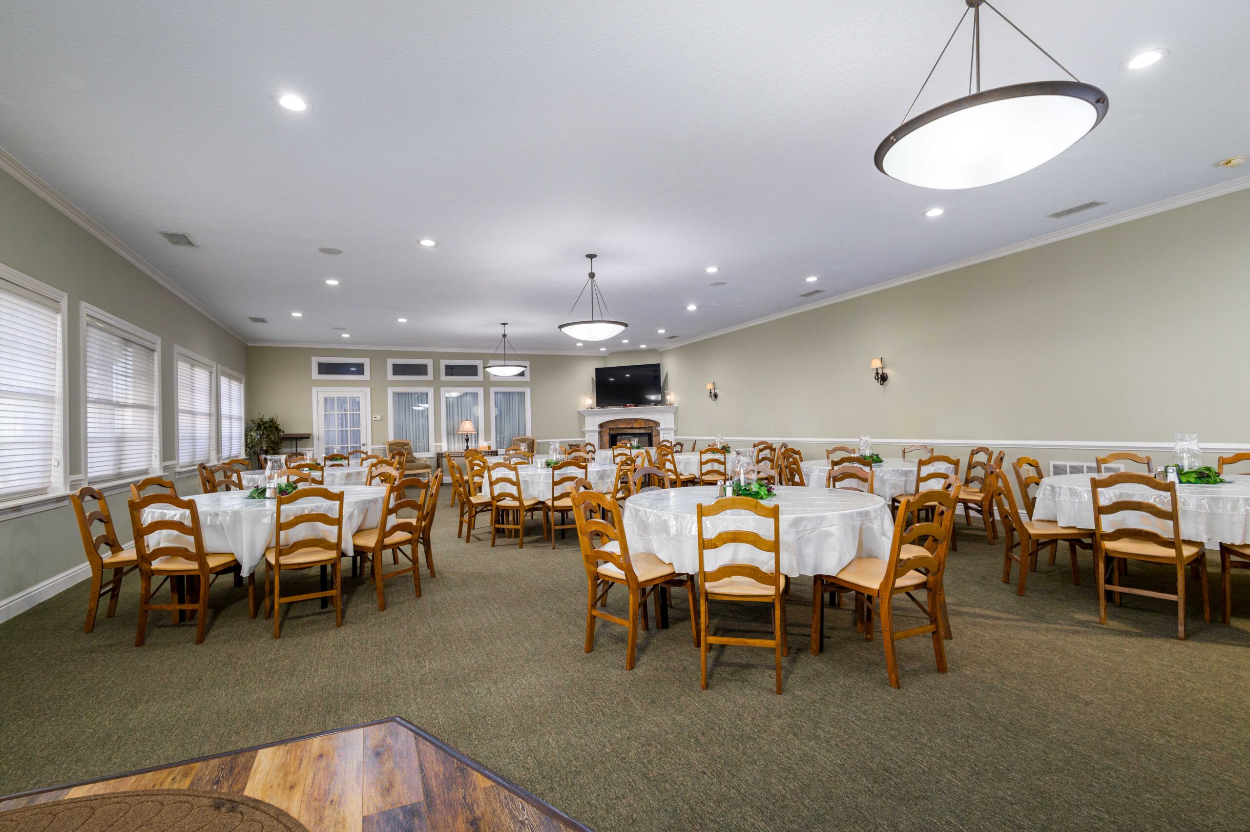 The Shorac Family Center dining room set with tables and chairs
